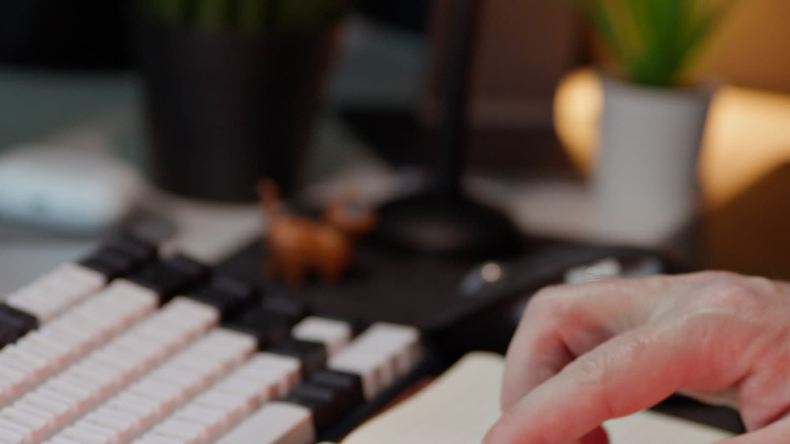 A hand checking items off a to-do list